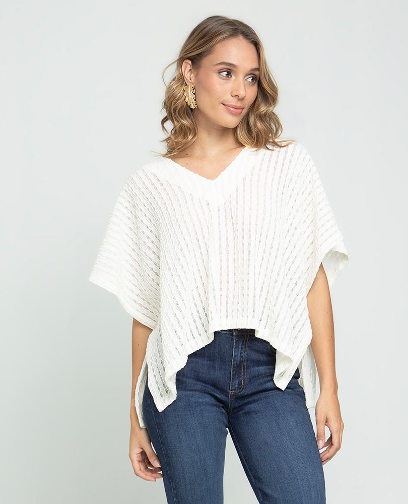 PONCHO TEJIDO PARA MUJER ESCOTE V EN TELA CON EFECTO DESAGUJADO