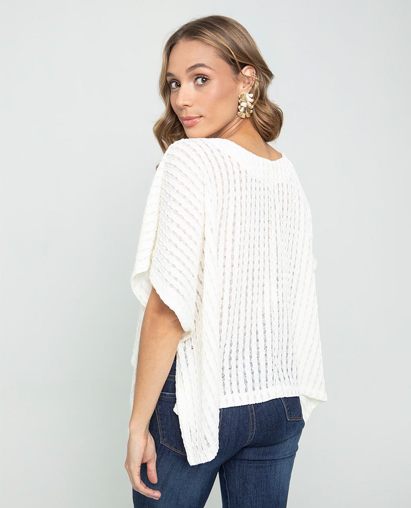 PONCHO TEJIDO PARA MUJER ESCOTE V EN TELA CON EFECTO DESAGUJADO