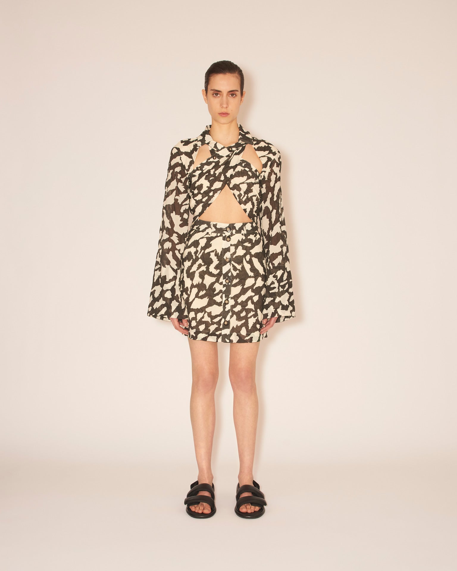 Loiza Long sleeve top with wrapped and twisted front Animal print