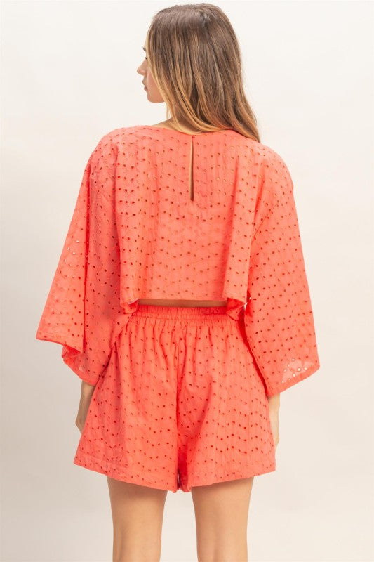 Eyelet long sleeve top and shorts.
